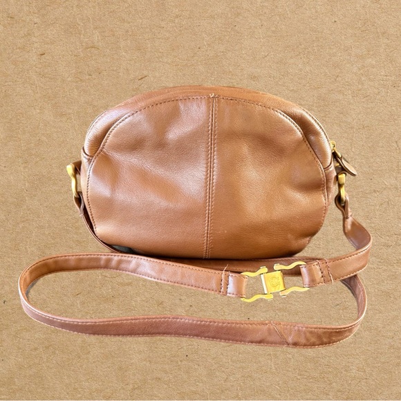 Brown leather crossbody bag. Gold tone hardware on the strap,& zipper. - Picture 2 of 8